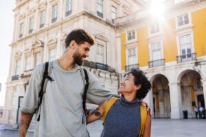 Tourists visiting lisbon enjoying vacation in portugal