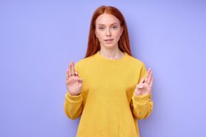 young good-looking ginger girl learning body language